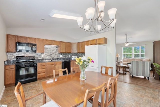 410 Garden Gate Ct, Duncan, SC 29334 - dining area with lofted ceiling, ceiling fan, and a chandelier