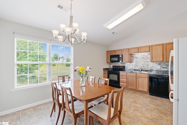410 Garden Gate Ct, Duncan, SC 29334 - dining space featuring vaulted ceiling, healthy amount of natural light, a chandelier, and baseboards
