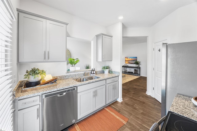 116 Southridge Ct, Easley, SC 29642 - kitchen with appliances with stainless steel finishes, a sink, dark wood finished floors, light stone countertops, and recessed lighting