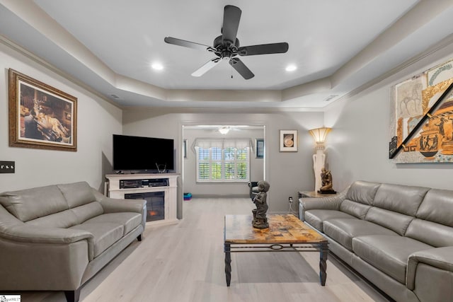30 Eaglecrest Ct, Simpsonville, SC 29681 - living room featuring a tray ceiling, ceiling fan, light wood-style flooring, and recessed lighting