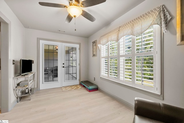 30 Eaglecrest Ct, Simpsonville, SC 29681 - living area with french doors, wood finished floors, ceiling fan, and baseboards