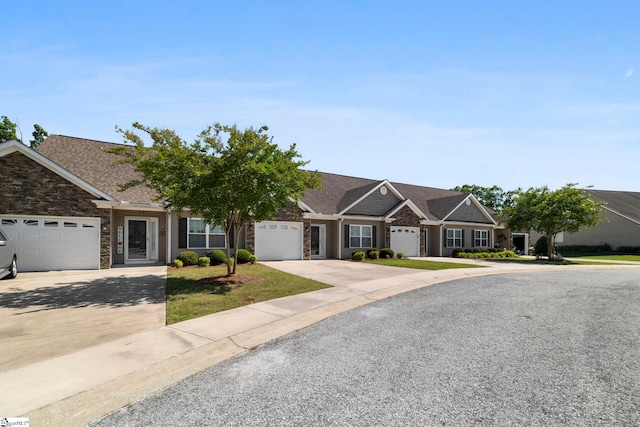 30 Eaglecrest Ct, Simpsonville, SC 29681 - view of front facade featuring driveway, a garage, stone siding, and a shingled roof