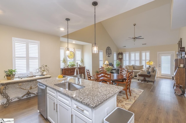 101 Greensdale Ln, Easley, SC 29642 - kitchen with a sink, stainless steel dishwasher, a ceiling fan, white cabinetry, and wood finished floors