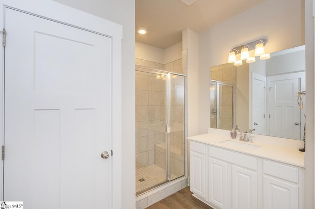 101 Greensdale Ln, Easley, SC 29642 - full bath featuring a shower stall, vanity, wood finished floors, and recessed lighting