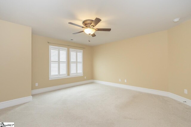 101 Greensdale Ln, Easley, SC 29642 - spare room with a ceiling fan, light colored carpet, and baseboards