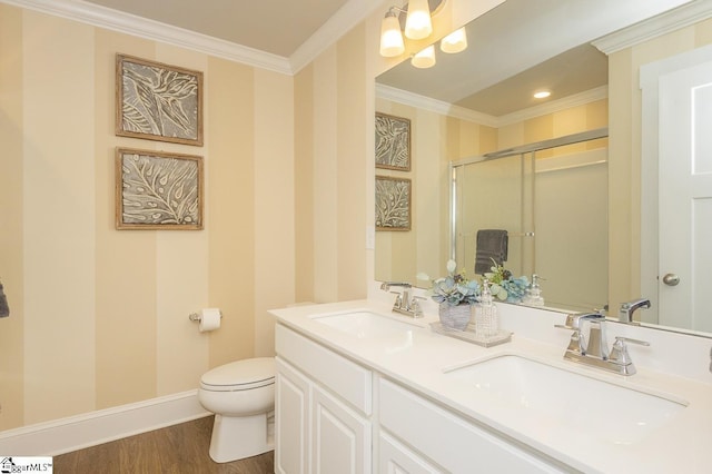 101 Greensdale Ln, Easley, SC 29642 - full bathroom featuring a shower stall, toilet, double vanity, ornamental molding, and wood finished floors