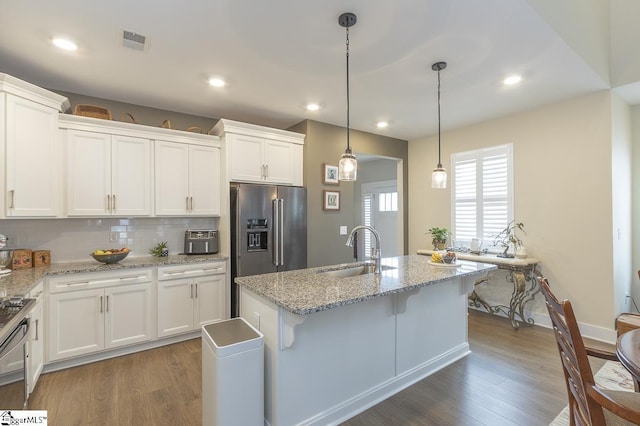 101 Greensdale Ln, Easley, SC 29642 - kitchen featuring a sink, white cabinetry, wood finished floors, and recessed lighting