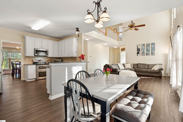 105 Franklin Meadow Way, Greer, SC 29651 - dining area featuring dark wood-style flooring, a ceiling fan, and a chandelier