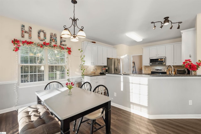 105 Franklin Meadow Way, Greer, SC 29651 - dining space featuring dark wood-style flooring and baseboards