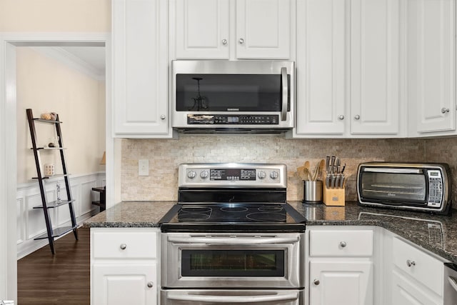 105 Franklin Meadow Way, Greer, SC 29651 - kitchen featuring appliances with stainless steel finishes, crown molding, white cabinetry, tasteful backsplash, and dark wood-style floors