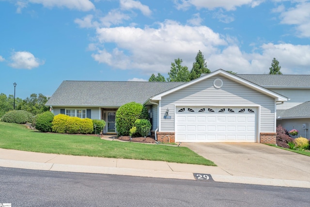 29 River Birch Way, Greer, SC 29650 - view of front of house with brick siding, driveway, a front lawn, and a garage