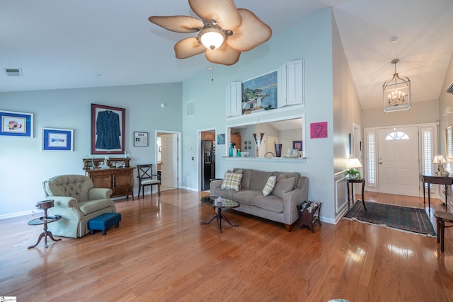29 River Birch Way, Greer, SC 29650 - living room featuring high vaulted ceiling, wood finished floors, baseboards, a chandelier, and ceiling fan