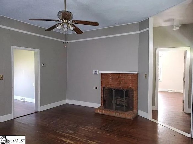 8 Sue Cleveland School Rd, Piedmont, SC 29673 - unfurnished living room with a ceiling fan, wood finished floors, a fireplace, and baseboards