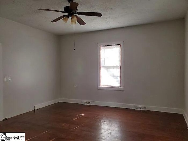 8 Sue Cleveland School Rd, Piedmont, SC 29673 - empty room featuring baseboards, ceiling fan, dark wood-style floors, and a textured ceiling