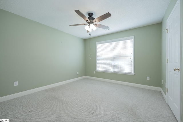 14 Saint Thomas Ct, Greer, SC 29651 - spare room with a ceiling fan, light colored carpet, and baseboards