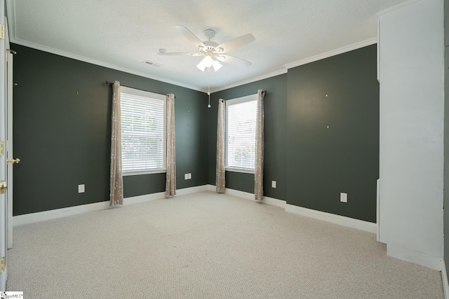 14 Saint Thomas Ct, Greer, SC 29651 - carpeted empty room featuring a ceiling fan, ornamental molding, baseboards, and a textured ceiling