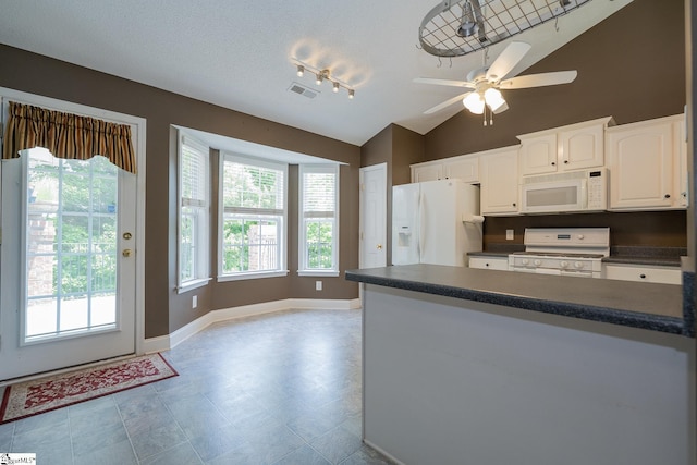 14 Saint Thomas Ct, Greer, SC 29651 - kitchen with white appliances, dark countertops, a peninsula, white cabinetry, and a ceiling fan