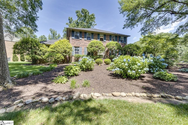 101 N Lady Slipper Ln, Greer, SC 29650 - colonial inspired home featuring brick siding and a front lawn
