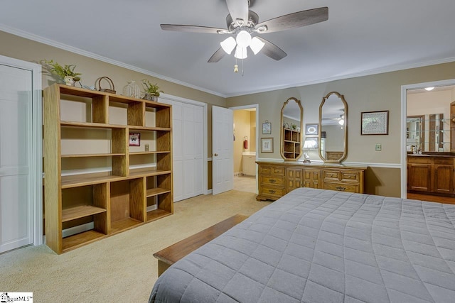 101 N Lady Slipper Ln, Greer, SC 29650 - bedroom with light carpet, crown molding, connected bathroom, a ceiling fan, and two closets