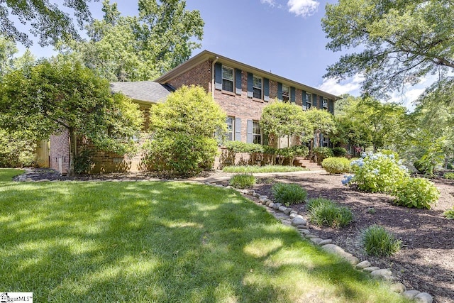 101 N Lady Slipper Ln, Greer, SC 29650 - view of front of house featuring brick siding and a front yard