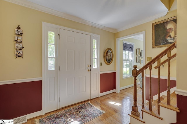 101 N Lady Slipper Ln, Greer, SC 29650 - entrance foyer with ornamental molding, stairway, light wood-style flooring, and baseboards