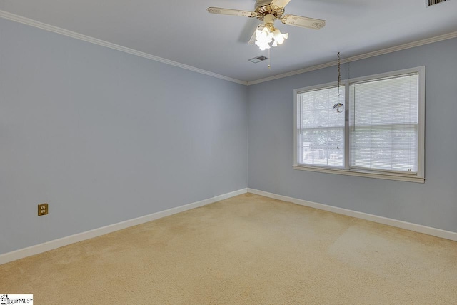101 N Lady Slipper Ln, Greer, SC 29650 - carpeted spare room with ornamental molding, baseboards, and a ceiling fan