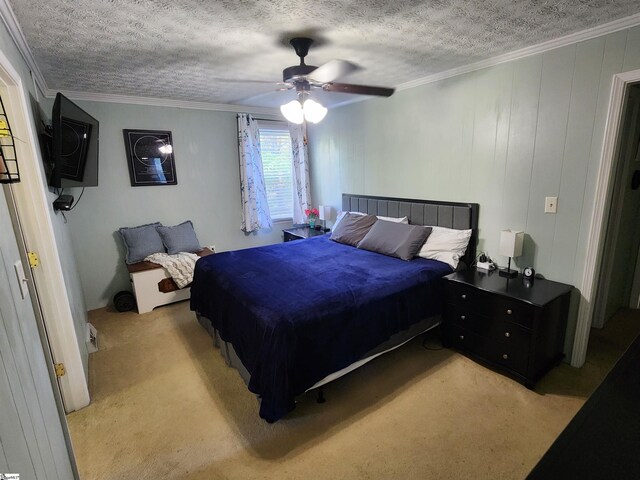 1104 Robert P Jeanes Rd, Easley, SC 29640 - bedroom featuring light carpet, ornamental molding, a ceiling fan, and a textured ceiling