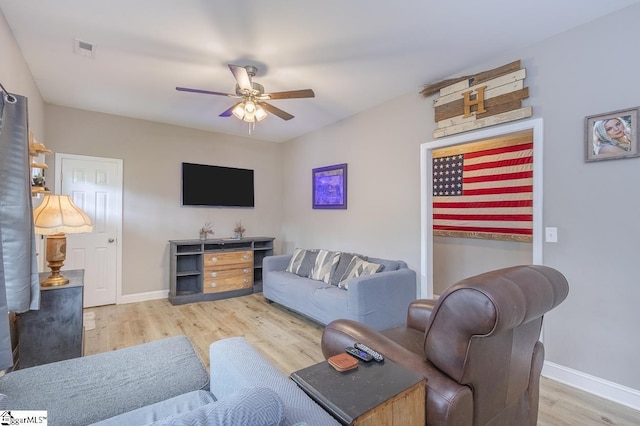 317 Saluda St, Belton, SC 29627 - living room with ceiling fan, wood finished floors, and baseboards