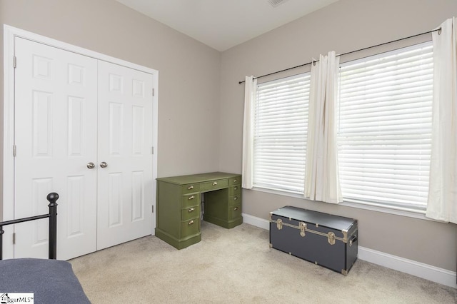 317 Saluda St, Belton, SC 29627 - unfurnished bedroom with light carpet, baseboards, and a closet