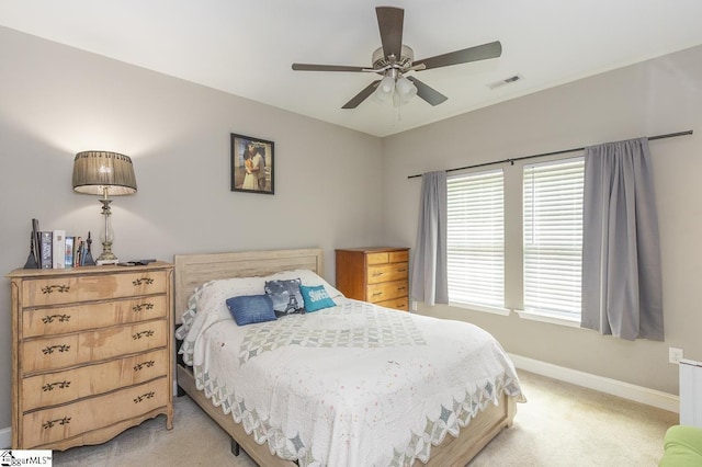 317 Saluda St, Belton, SC 29627 - bedroom featuring baseboards, light carpet, and a ceiling fan