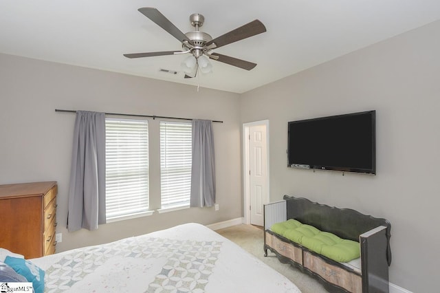 317 Saluda St, Belton, SC 29627 - bedroom with carpet floors, baseboards, and a ceiling fan