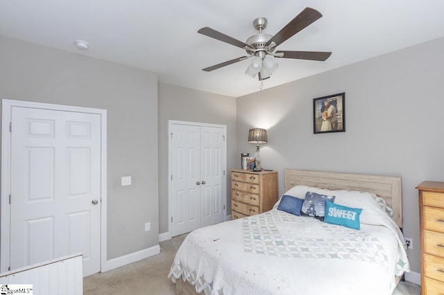317 Saluda St, Belton, SC 29627 - bedroom featuring light colored carpet, baseboards, a closet, and ceiling fan