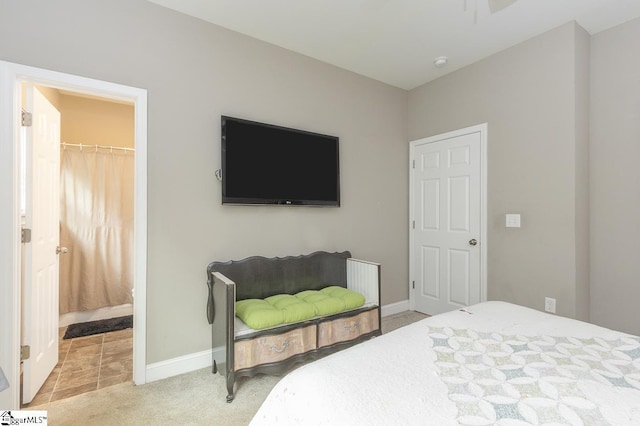 317 Saluda St, Belton, SC 29627 - bedroom with light colored carpet, baseboards, and a spacious closet