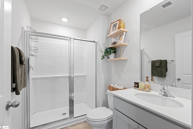 206 Bonifay Dr, Fountain Inn, SC 29644 - bathroom with vanity, a stall shower, and toilet