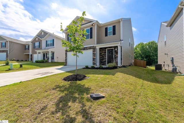 206 Bonifay Dr, Fountain Inn, SC 29644 - view of front of home featuring concrete driveway, stone siding, central air condition unit, and a garage