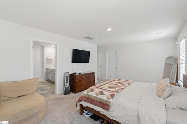 206 Bonifay Dr, Fountain Inn, SC 29644 - bedroom with light colored carpet, arched walkways, ensuite bath, and recessed lighting