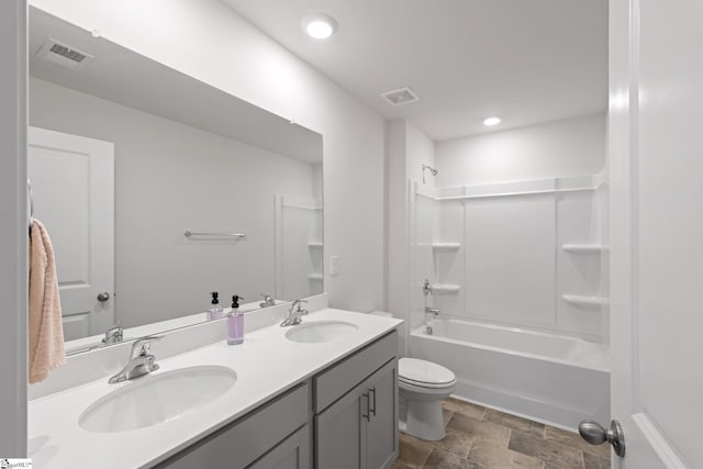 206 Bonifay Dr, Fountain Inn, SC 29644 - full bath featuring toilet, double vanity, stone finish floors, tub / shower combination, and recessed lighting