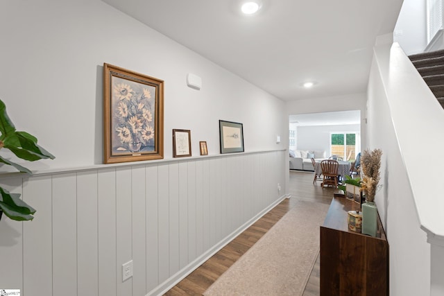 206 Bonifay Dr, Fountain Inn, SC 29644 - corridor featuring wood finished floors, a wainscoted wall, stairway, and recessed lighting