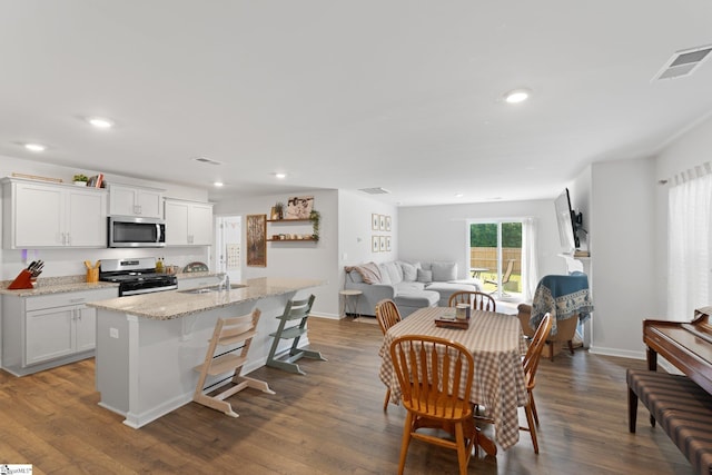 206 Bonifay Dr, Fountain Inn, SC 29644 - dining area featuring dark wood-style floors, recessed lighting, and baseboards