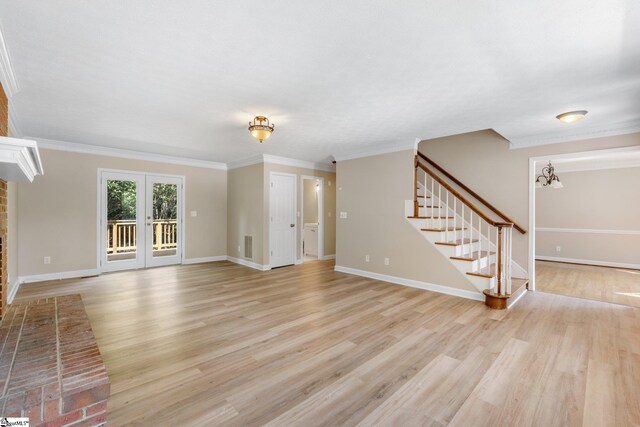 28 Bernwood Dr, Taylors, SC 29687 - unfurnished living room featuring stairs, light wood-style flooring, baseboards, and ornamental molding