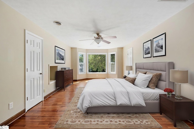 28 Bernwood Dr, Taylors, SC 29687 - bedroom featuring wood finished floors, ceiling fan, and baseboards