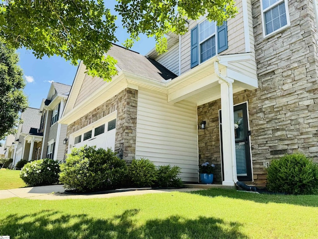 200 Odie Dr, Simpsonville, SC 29681 - view of front of home featuring stone siding and a front lawn