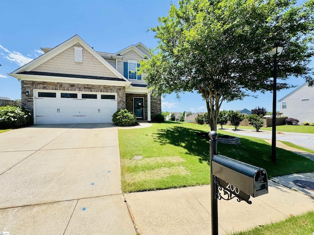 200 Odie Dr, Simpsonville, SC 29681 - view of front of house with stone siding, a front lawn, driveway, and an attached garage