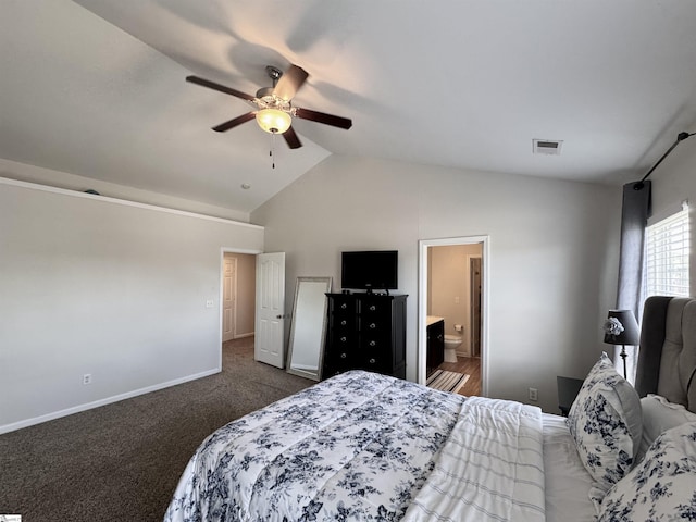 200 Odie Dr, Simpsonville, SC 29681 - bedroom with baseboards, high vaulted ceiling, dark carpet, ceiling fan, and ensuite bathroom