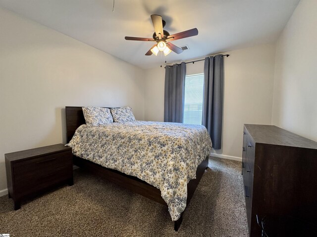 200 Odie Dr, Simpsonville, SC 29681 - bedroom featuring dark colored carpet, baseboards, and a ceiling fan