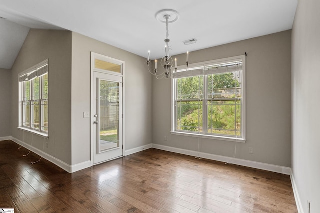 239 Applehill Way, Simpsonville, SC 29681 - unfurnished dining area with a chandelier, wood-type flooring, plenty of natural light, and baseboards