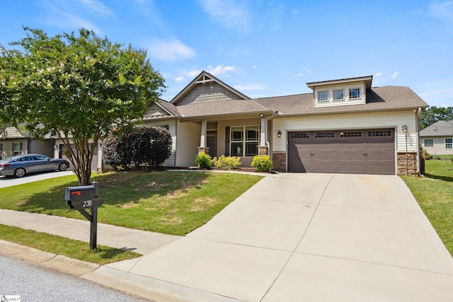 239 Applehill Way, Simpsonville, SC 29681 - craftsman inspired home featuring a front lawn, stone siding, an attached garage, and concrete driveway