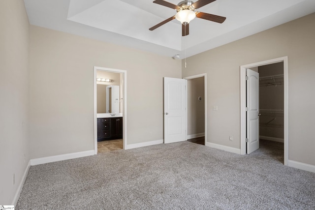 239 Applehill Way, Simpsonville, SC 29681 - unfurnished bedroom with light carpet, a walk in closet, a closet, baseboards, and connected bathroom