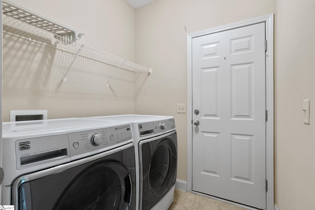 239 Applehill Way, Simpsonville, SC 29681 - washroom featuring separate washer and dryer, baseboards, and light tile patterned floors