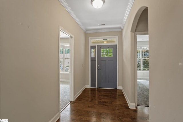 239 Applehill Way, Simpsonville, SC 29681 - foyer entrance featuring crown molding, dark wood-style floors, baseboards, and arched walkways